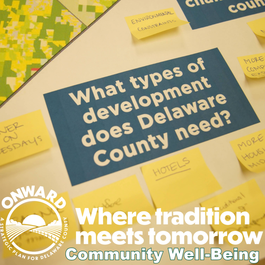 Brochure Why-9-#5 Workshop board with "What types of development does Delaware County need?" question in the middle, surrounded by sticky notes with participant responses.